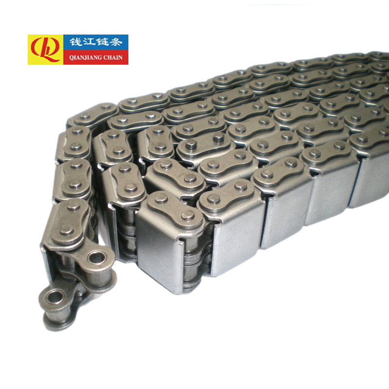 Roller chain with vulcanised elastomer profiles